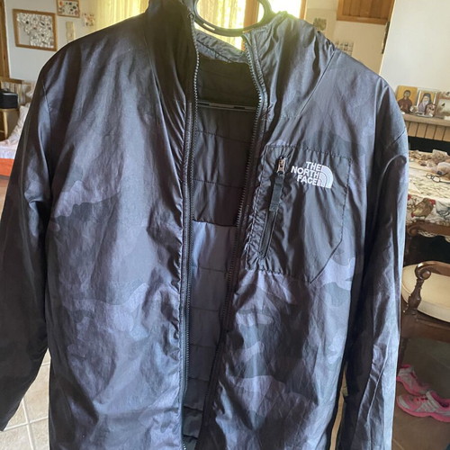 The North Face jacket used, reversible, size S, black and gray