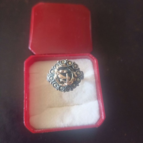 Silver ring used with 18k gold and stones