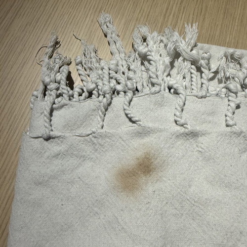 Beach towel used with a small stain