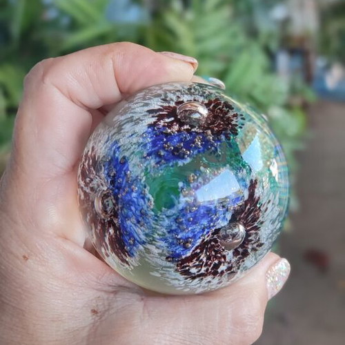 Glass ornament with beautiful blue flowers