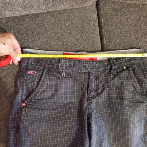 O'Neill women's shorts used, size 28, colorful checkered pattern