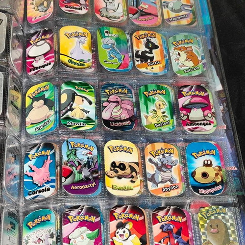Pokemon GO The Original Metal Tags Album like new with 270 metal tags