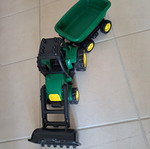 Plastic toy tractor with excavator and detachable trailer