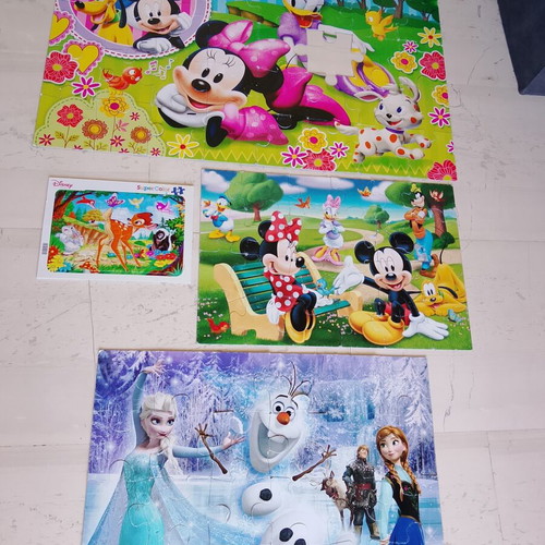 Disney puzzles pack of 4 used with Minnie, Mickey Mouse, Frozen