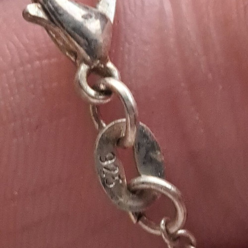 Silver pendant with sphere like new