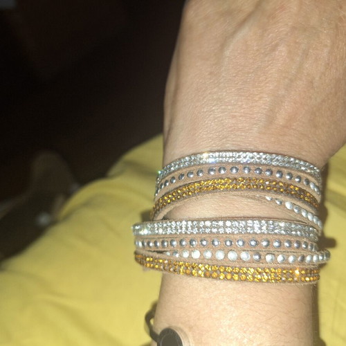 Bracelet with brown, orange, and silver clasp, like new