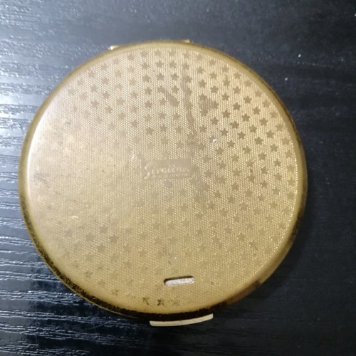 Vintage powder compact used gold plated with 1970 flowers