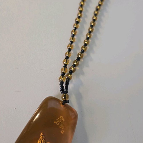 Pendant necklace with resin shells like new