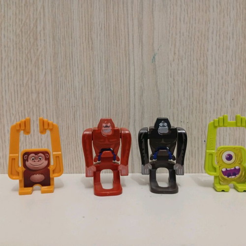 Kinder Joy Surprise figures used, set with monkeys and gorillas