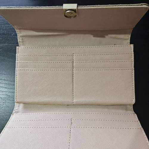 Wallet used beige with small signs of wear