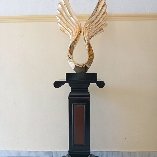 Wooden room decor like new with golden wings and hidden cabinet
