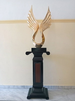 Wooden room decor like new with golden wings and hidden cabinet