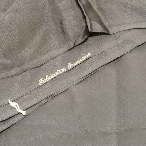 Black satin fabric used for women's dresses