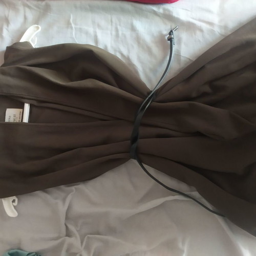 Sleeveless vest used with black belt, size S