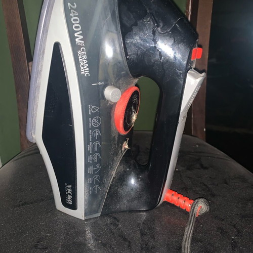 Ceramic steam iron used with steam and water outlets