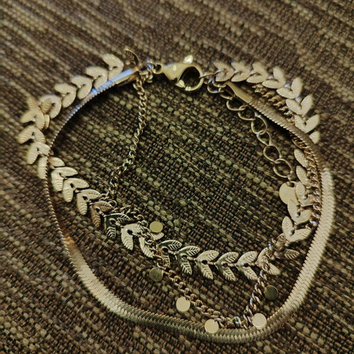Steel bracelet new, triple, gold color