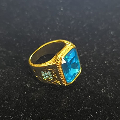 Vintage gold tone men's ring with large blue rectangular stone