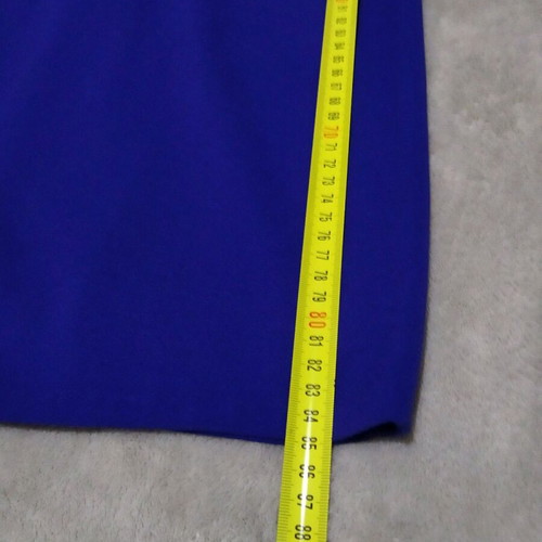 blue dress with an opening at the back