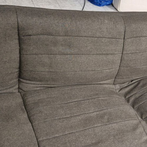 Click Clack Sofa Bed used with small tear at the back