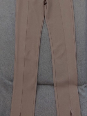 Pink Woman bell-bottom leggings XS like new, nude rib texture