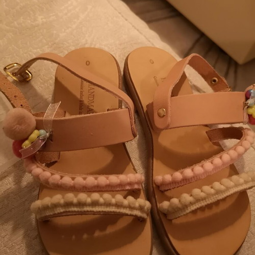 Handmade children's sandals size 30, beige with pom-poms