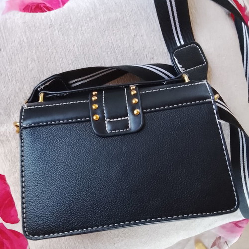 Black shoulder bag with lion design and rose gold details new