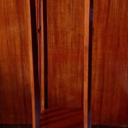 Handcrafted tall wooden plant stand with carved floral details