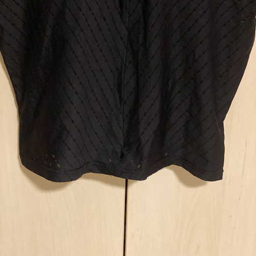 Vogue black elastic blouse with V-neck and zipper