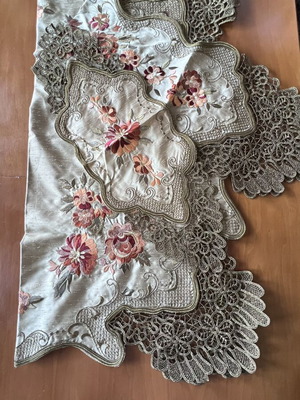 Set of table linens new, large and small doilies