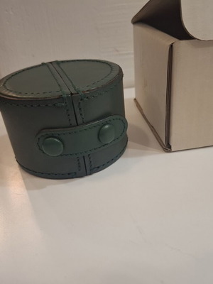 Cylindrical leather vintage travel case with small clock by Giorgio Pizzitutti