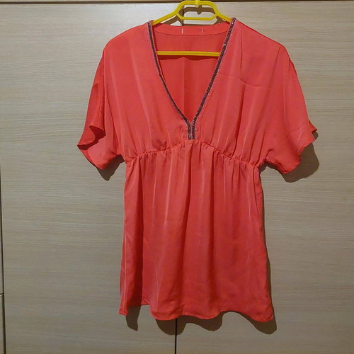Coral satin-like blouse with V and rhinestones like new, size Medium