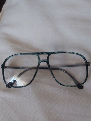 Vintage eyeglass frame with metal arms, like new, blue tortoise