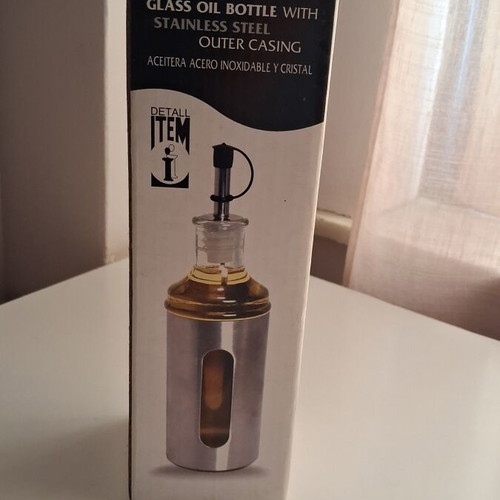 ITEM International glass oil bottle with stainless steel casing