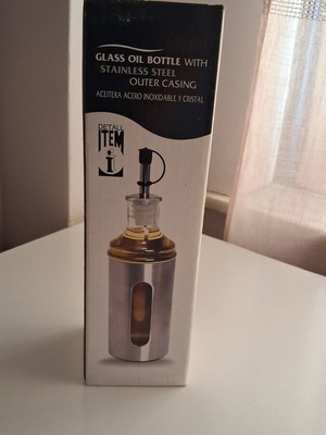 ITEM International glass oil bottle with stainless steel casing
