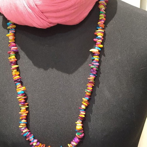 Colorful summer necklace made of brightly colored shells