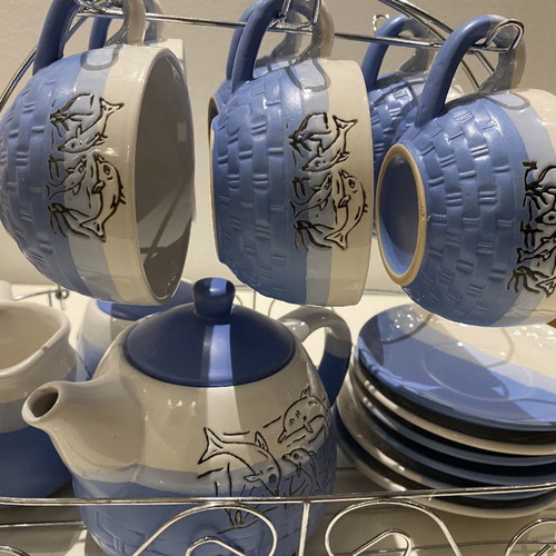 Ceramic tea set used with carved designs, 6 cups