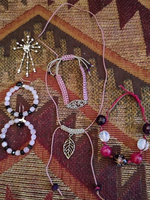 Jewelry like new, handmade except the cross, pink and purple