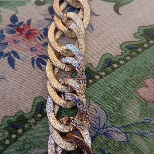 Necklace used, thick gold-tone chain with embossed finish