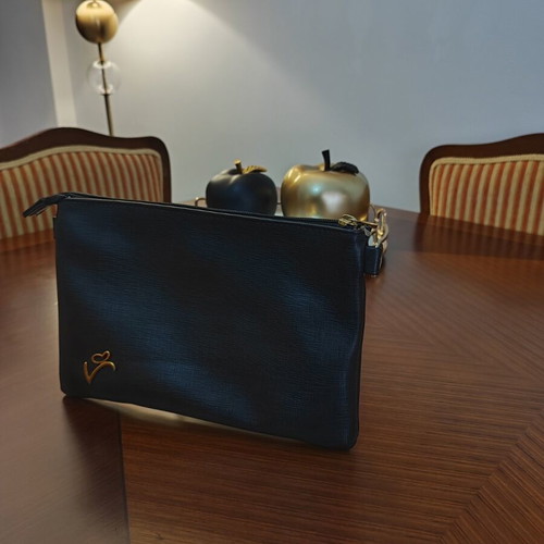 Black Leatherette Bag like new with gold details