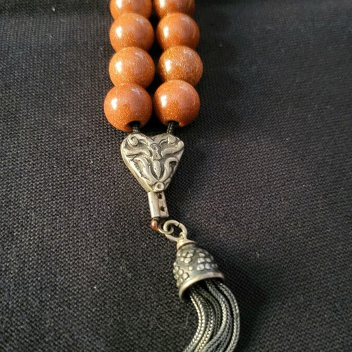 Komboloi made of goldstone and 925 silver like new