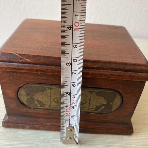 Wooden jewelry box with brass details used