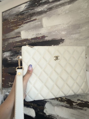 Chanel beige leather clutch bag