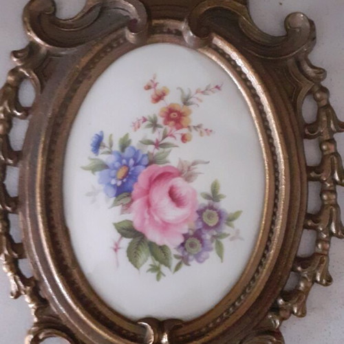 Porcelain miniatures like new with bronze border