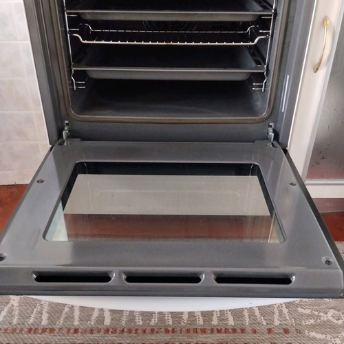 Gas stove with electric oven like new