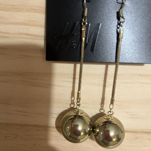 Dangling earrings, gold color, new