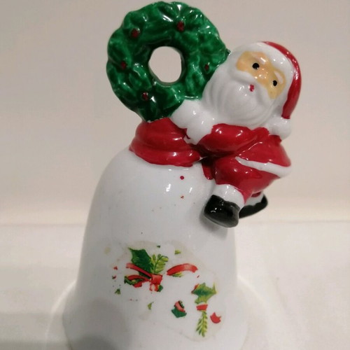 Ceramic bell like new with Santa Claus and wreath
