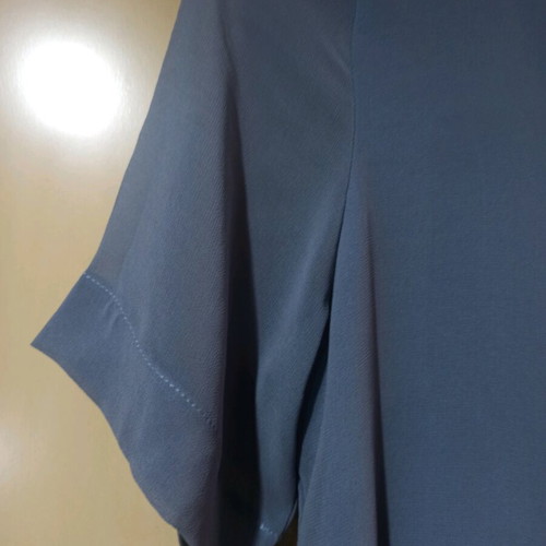 Turquoise blouse like new, lightly worn, with transparent sleeves size M