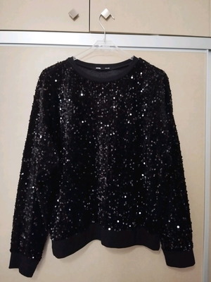 Sinsay blouse in sweatshirt style with sequins used, black size M