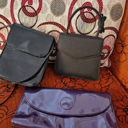 Small bags and a clutch used, black and purple
