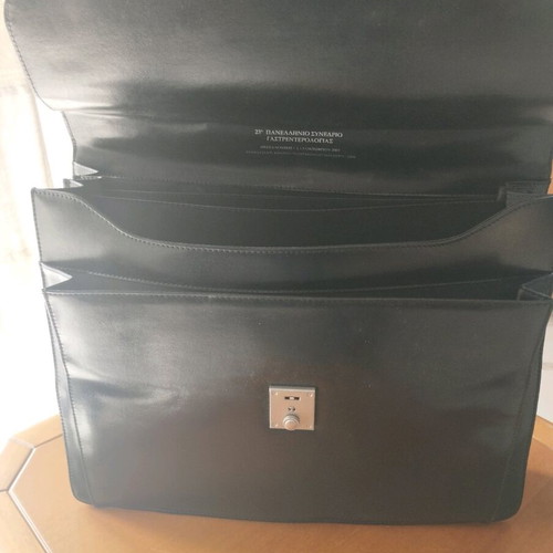 Bartuggi leather briefcase new with key, black